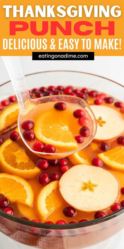 This Homemade Thanksgiving Punch is perfect to serve with your Thanksgiving dinner. It is full of fall flavors and is made with simple ingredients. This punch can be made in a variety of ways. Serve this Thanksgiving punch in fun glasses with slices of oranges, fresh cranberries and more. The best fall drink to serve this holiday season. #eatingonadime #thanksgivingpunchrecipe #punch Jingle Juice Recipe, Thanksgiving Drinks Non Alcoholic, Fall Punch Recipes, Thanksgiving Punch, Cranberry Punch, Fun Glasses, Alcoholic Punch Recipes, Non Alcoholic Punch, Easy Punch Recipes