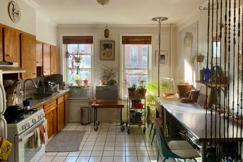 Narrow Bushwick Railroad Apartment Rental Photos | Apartment Therapy Kitchen With 2 Windows, Table Against Wall, Diy Wall Molding, Architecture Desk, Railroad Apartment, Dining Chairs White, Mini Dishwasher, Rolling Carts, Seattle Apartment