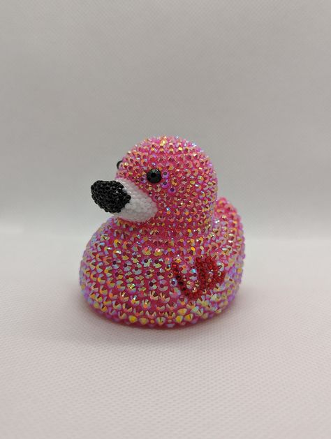 Flamingo rhinestone rubber duck. A perfect gift for yourself or your favorite off-road enthusiast! Each rhinestone is hand-placed. Duck is approximately 2.75 in. x 2.75 in. You may notice an odor coming from the duck. It is from the extra-strength glue used to place the rhinestones. Leave the duck in a well-ventilated area, and the smell will dissipate in a few days. *If you plan to keep the duck in a vehicle, keep an eye on it when it is hot outside. Rubber ducks are known to melt or misshapen Bedazzled Rubber Ducks, Bedazzled Things, Jeep Ducks, Pregnancy Costumes, Blue Sky Wallpaper, Bling Ideas, Flamingo Theme, Rhinestone Projects, Hot Outside