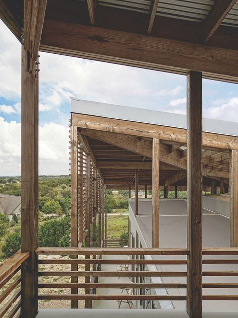 The house features an expansive double roof system. A detached upper roof folds to exploit winds across the hill site, passively forcing extractive cooling, and offering a suitably oriented architectural support for solar photovoltaic panels. It also allowed for the creation of a unique roof deck that overlooks the landscape. Double Roof Design, Multigenerational Living, Co Housing, Photovoltaic Panels, Shed Roof, Roof Window, Roof Structure, Mountain Designs, Windows Exterior