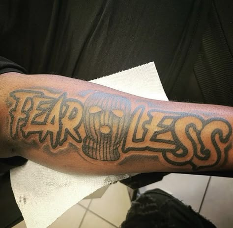 2000 Tattoo Ideas For Men, Jersey Number Tattoo, Move In Silence Tattoo, Heartless Tattoo Men, Dude Tattoos, Fearless Tattoo Men, Fear None Tattoo, Hood Tattoo For Men Forearm, Otf Tattoo Tat