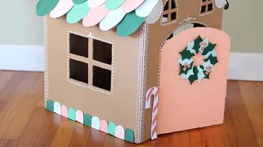 How To Make A Festive Cardboard Gingerbread House For Your Pets Using Old Boxes | Cuteness Cat House Diy Cardboard, Cardboard Gingerbread, Cardboard Rocket, Cardboard Box Houses, Cardboard Gingerbread House, Cardboard Cat House, Cat House Diy, Cardboard Box Crafts, Dog House Diy