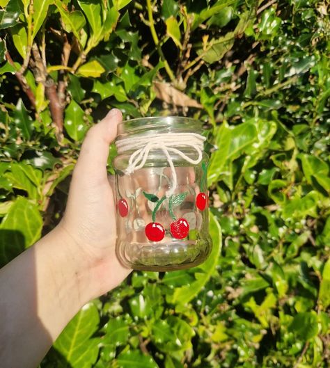 Hand painted and upcycled cherry glass jar 🍒 Perfect for storing jewellery, trinkets, fairy lights, and more! For more details, visit my etsy linked in my bio or dm me for details! #upcycled #upcycledart #upcycling #upcycledglass #handmade #handpainted #handpaintedjars #handpaintedjar #cherry #cherries #acrylicpainting #acrylic #painting #paintedjar #upcycledjar #upcycledjars #sustainability #sustainableart #homedecor #home #housedecoration #housedecor #etsy #etsyshop #smallbusiness #etsy... Sustainable Art, Upcycled Art, Glass Jar, Fairy Lights, Dm Me, Glass Jars, Sustainability, Acrylic Painting, Cherry