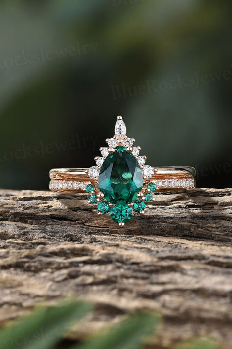 ◆ Center Stone ◆ • Type: Lab Emerald • Shape & Size: Pear, 8*6mm ◆ Side Stones ◆ • Type: Moissanite / CZ • Shape: Round & Marquise • Total Carat: approx 0.13ct ❀❀❀Wedding Band❀❀❀ ◆ Stones ◆ • Type: Lab Emerald • Shape: Rounde • Total Carat: approx 0.212ct • Type: Moissanite / CZ • Shape: Rounde • Total Carat: approx 0.068ct Pear-shaped Green Emerald Ring For Wedding, Pear-shaped Green Emerald Ring, Pear-shaped Emerald Ring With Accent Stones, Pear-shaped Cubic Zirconia Emerald Ring For Wedding, Exquisite Pear-shaped Emerald Jewelry, Pave Wedding Ring, Antique Ring Settings, Wedding Ring Antique, Pave Wedding Rings