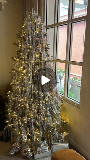 Loui Burke on Instagram: "Easy way to decorate your tree this Christmas or New Year’s using Lametta tinsel! 

A classic throwback style from the 1930s/50s and now today. Be sure to cut it this way so you can save it for years to come! 🎄✨ 

I’ll be welcoming the New Year in style with a bit of glam and sparkle. 
 
#nye#nyeparty#newyearseve#partydecor" Lametta Tinsel Tree, Christmas Tree With Tinsel Icicles, How To Add Tinsel To Christmas Tree, Christmas Tree Tinsel Ideas, Tinsel Christmas Tree Decoration, Tinsel On Tree, Tinsel Tree Decorating Ideas, Christmas Tree With Tinsel, Tree With Tinsel