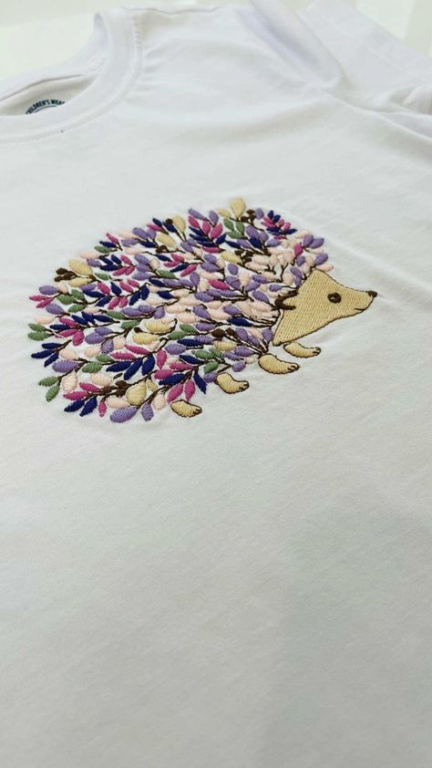 Adorning Your T-Shirt with a Delightful Hedgehog Embroidery Design Wearing a t-shirt is about comfort and expression, and what better way to express oneself than with a touch of art? Enter the hedgehog embroidery design - a subtle yet captivating design that's perfect for both adults and kids. Merging Nature's Charm with Everyday Fashion Hedgehogs, with their spiky appearance yet gentle nature, are a favorite among many. Translating this creature's essence into embroidery brings... Embroidery Hedgehog Simple, Embroidery Hedgehog, Embroidered Hedgehog, Hedgehog Embroidery, Personalised Embroidery, Personalized Embroidery, Free Embroidery Designs, Free Embroidery, Business Resources