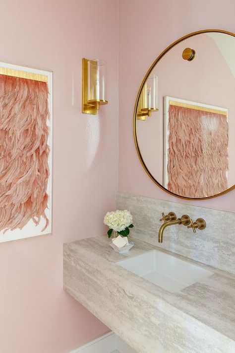 Feminine blush pink powder room features a marble floating sink vanity fitted with a brushed gold faucet fixed to a marble backsplash beneath a round gold mirror. Floating Sink Vanity, Pink Powder Room, Brick Tile Backsplash, Grey Marble Wallpaper, Black Powder Room, Cottage Style Bathrooms, Floating Sink, Round Gold Mirror, Gold Faucet