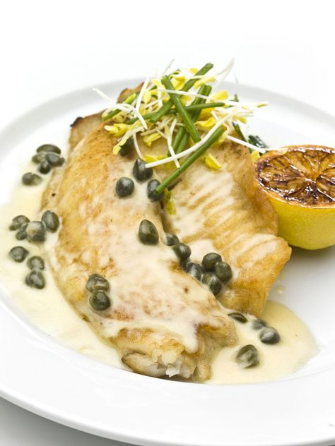 An elegant dish of lightly pan-fried tilapia fillets in a sauce of white wine, fresh lemon juice and capers. A go-to recipe for special occasions. Hog Fish, Ginger Butter, Snapper Recipes, Lemon Caper Sauce, Turkey Cutlets, Caper Sauce, Italian Gourmet, Special Occasion Food, Tilapia Recipes