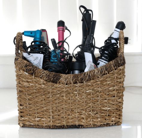 hair tools stored in a basket Hair Utensil Storage, Hair Products Storage Ideas, Hair Brush Storage Ideas, Storing Hair Tools, Hair Styling Storage, Ways To Store Hair Tools, Styling Tools Organization, Hair Tools Storage, How To Store Hair Tools