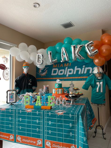 Miami Dolphins Theme Birthday Party, Miami Dolphin Birthday Party, Dolphins Football Cake, Miami Dolphins Party Decorations, Miami Dolphins Party Ideas, Miami Dolphins Birthday Party, Nfl Birthday Party, Miami Dolphins Party, Miami Dolphins Cake