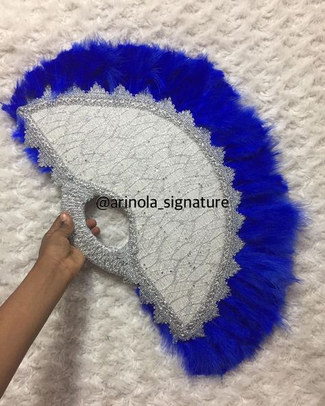 Handfans, aso oke & Veil on Instagram: “Royal blue with silver clutch embellished hand fan @arinola_signature. . . #handfan #handfaninlagos #engagementfan #luxuryfan…” Silver Clutch, Aso Oke, Hand Fan, Festival Captain Hat, Veil, Royal Blue, Asos, Fan, Silver