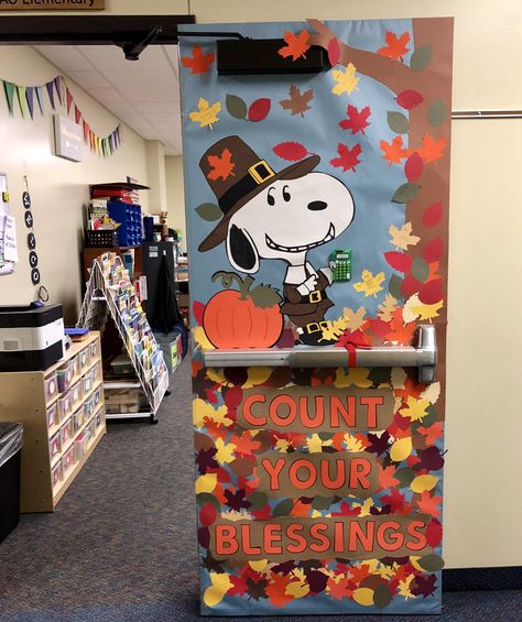 Snoopy! Fall door decor! Count your Blessings Thanksgiving Fall Classroom Doors, Charlie Brown Thanksgiving Door Decorations, Snoopy Fall Classroom Door, Snoopy Thanksgiving Classroom Door, Snoopy Thanksgiving Bulletin Board, Door Decoration Thanksgiving, Thanksgiving Teacher Door, Snoopy Fall Bulletin Board Ideas, Snoopy Fall Decor