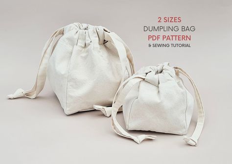 In small and large size. The dumpling bag is PDF sewing pattern and step by step tutorial is available to download :~) Origami Bag, Bag Sewing Pattern, Dumpling Bag, Fabric Pen, Bag Sewing, Drawstring Bucket Bag, Bag Patterns To Sew, Drawstring Pouch, Printable Patterns