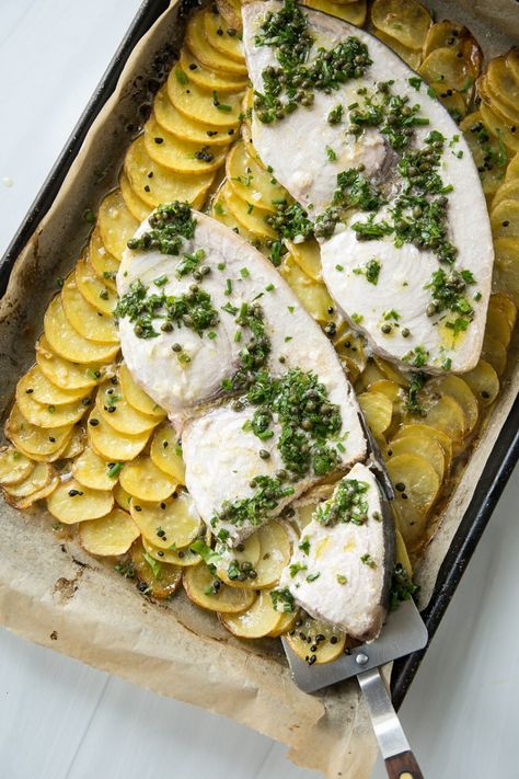 The sheet pan method for baked swordfish steaks in the oven uses an easy Greek lemon-garlic marinade over slivered potatoes - one of my family’s gluten-free and dairy-free weeknight go-to dinners! Lemony Potatoes, Steaks In The Oven, Baked Swordfish, Greek Chicken And Potatoes, Swordfish Steak, Herb Dressing, Garlic Marinade, Seafood Diet, Greek Potatoes