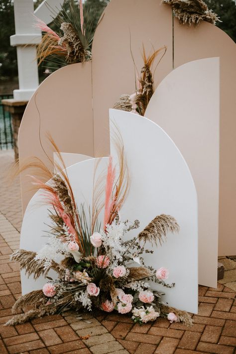 Wood panels decorated with a boho arrangement of pampas, ruscus and blush blooms. Panel Wedding Backdrop, Boho Arrangements, Signage Design Ideas, Wedding Backdrop Arch, Brunch Picnic, Egyptian Party, Boy Baby Shower Centerpieces, Backdrop Arch, Mehndi Party