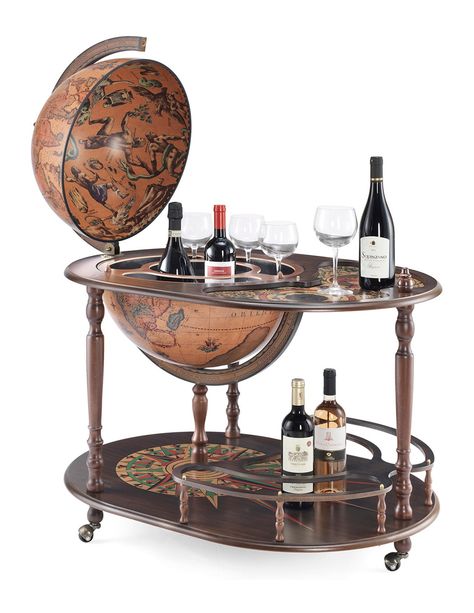 This magnificent large bar cart trolley is sure to make heads turn. Three generations of Italian globe-making experience are showcased by every feature of this globe bar serving cart, beginning with the 20-inch antiquated world globe that is crafted using a time-honored method: authentic reproductions of 16th century maps are fixed to the base sphere in layers to give the globe its superb detail and lovely, classic color. The antique true replica world globe of this piece of period furniture rot Globe Bar Cart, Wooden Bar Cabinet, Floor Globe, Globe Bar, Leather Couches, Bar Serving Cart, Couches Living, Globe Vintage, Italian Bar