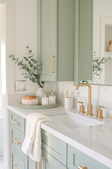 Bathroom Decor Minimal, Gold And Sage Bathroom, Sage Green And Gold Bathroom Ideas, Sage Green In Bathroom, Sage And Gold Bathroom, Sage Green House Decor, Sage Bathroom Cabinets, Light Green Bathroom Vanity, Sage Green Vanity Bathroom