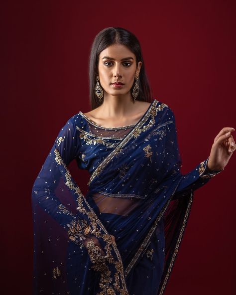 R E E M S A R E E. Enchant in our breathtaking midnight blue tulle sari, shimmering with intricate Zardoz details and exquisite hand-embroidered accents. Every stitch is meticulously crafted to perfection, creating a timeless masterpiece of elegance and sophistication. #lehengadesigns #weddinglehengacholi #lehengadesign #lehenga #lehengacholi #bridallehenga #bridallehengacholi #bridallehengadesigner #lehengadesigns #boutiquelehengadesign #boutiquelehengacholi #lehengacholi #lehengacholic... Blue Tulle, Bridal Lehenga Choli, Lehenga Designs, Bridal Lehenga, Lehenga Choli, Midnight Blue, Lehenga, Hand Embroidered, Boutique