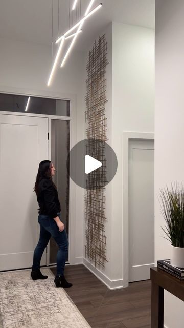 Erika Mertens on Instagram: "Easy home entryway DIY with Target art Details 👇🏻

For Links 👉🏻 Follow then Comment  ENTRYWAY You must be following first or the link will be hidden. Following tells IG you want to receive messages from me. 

I wanted to really showcase our 12 ft ceiling in our entryway, so I got 6 of these metal wall art pieces from Target and layered them together for one seamless look. I’m loving how it turned out! What do you think of it?

For Links 👉🏻 Follow the  Comment ENTRYWAY — must be following first or links will be hidden!

✨other ways to shop:
-tap the the link in my bio @modern.minimalist.home and head to my LTK page
-join my broadcast channel to receive notifications of daily deals & restocks

#targetpartner #paidlink #modernhomedecor #boujieonabudget #targ Small Entry Wall Decor Ideas, Entrance Wall Decor Ideas, Open Entryway, Foyer Wall Decor, Entryway Diy, Target Art, Wall Art Entryway, Minimalist Entryway, Foyer Wall