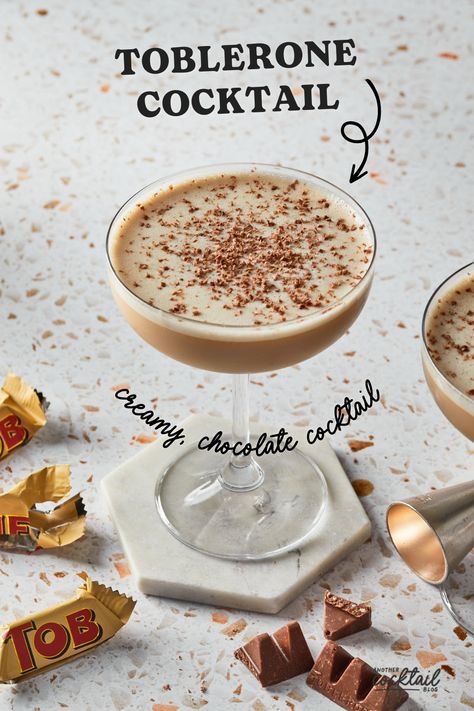 Inspired by the iconic Swiss chocolate, this rum based flip cocktail is made with Baileys, Frangelico and Kahlua. This sweet and creamy chocolate cocktail perfectly mimics the subtle flavors of honey and almond nougat you've grown to love with Toblerone chocolates. Chocolate Whiskey Cocktail, Chocolate Baileys Cocktail, Frangelico Cocktail, Toblerone Cocktail, Fall Martini, Flip Cocktail, Summer Martinis, Liqueur Cocktails, Banana Cocktails