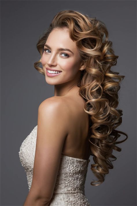 Discover the beauty of long curly hairstyles that radiate charm and sophistication. This striking look emphasizes the luscious fullness of your curls, creating an enchanting silhouette. Perfect for any occasion, long curls elevate your hairstyle game with their playful bounce and vibrant texture. Whether you wear them cascading down your back or styled in a half-updo, long curly hairstyles will definitely turn heads! Curly Hairstyles Wedding, Big Hair Curls, Down Curly Hairstyles, Cascading Curls, Long Curly Hairstyles, Volume Curls, Curly Wedding Hair, Curls For Long Hair, Big Curls