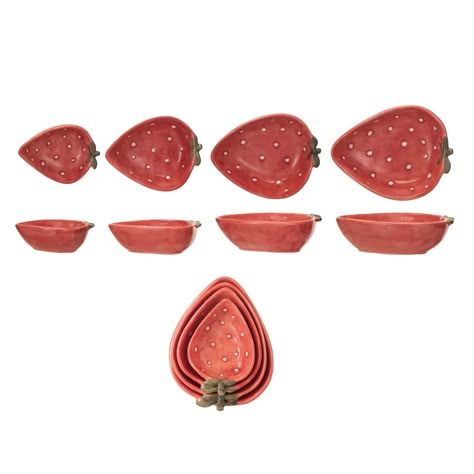 Buy the Strawberry Stoneware Measuring Cups Set at Michaels. com. This set of four hand-painted stoneware measuring cups adds a touch of whimsy and charm to any kitchen. This set of four hand-painted stoneware measuring cups adds a touch of whimsy and charm to any kitchen. A whimsical strawberry design in red, green, and white adorns each cup, making them a delight to use. These durable measuring cups are perfect for both dry and wet ingredients, and they will become a cherished addition to any Cottagecore Kitchen Accessories, Aesthetic Measuring Cups, Vintage Measuring Cups, Measuring Cups Aesthetic, Cute Kitchen Stuff, Cute Measuring Cups, Cute Dishware, Strawberry Kitchen Theme, Cute Kitchenware