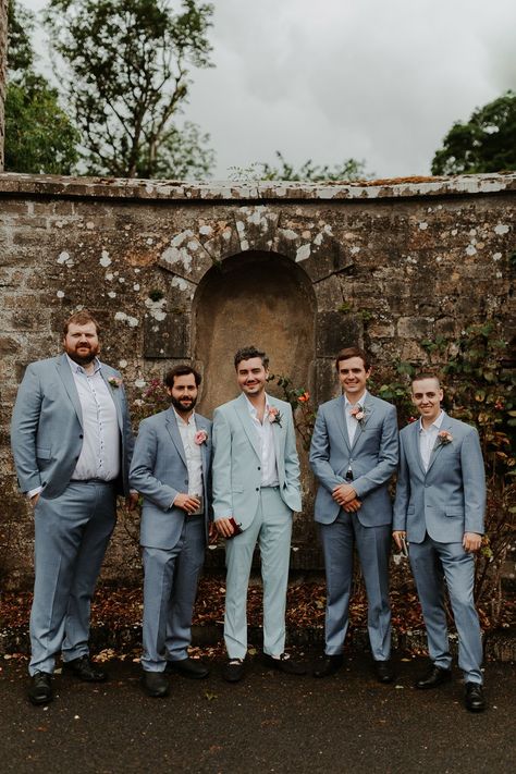 light blue groom and groomsmen suits Heather Blue Suit, Mismatched Blue Groomsmen, Light Blue Groom Suit Navy Groomsmen, Pale Blue Bridesmaid Dresses With Groomsmen, Steel Blue Groomsmen Attire, Groomsmen Spring Wedding, Light Blue Mens Suit, Groom Blue Suit Wedding, Dusty Blue Suit Groom