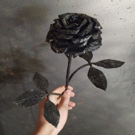 Handmade forged rose. The given dimensions are indicative. Each forged item is unique. Every item I will forge especially for you! Tolerance zone or dimensions can vary +/- 5 mm! Follow and subscribe: YouTube: https://www.youtube.com/@Pipeblacksmith Instagram: www.instagram.com/pipeblacksmith/ Facebook: www.facebook.com/Pipeblacksmith TikTok: www.tiktok.com/@pipeblacksmith Hand Forged Flower Shaped Jewelry Gift, Metal Rose Design Jewelry For Valentine's Day, Blacksmith Flowers, Welded Rose Metal Flowers, Rose Sculpture, 11th Anniversary Gifts, Metal Flowers Sculptures & Statues, Metal Roses, Iron Rose