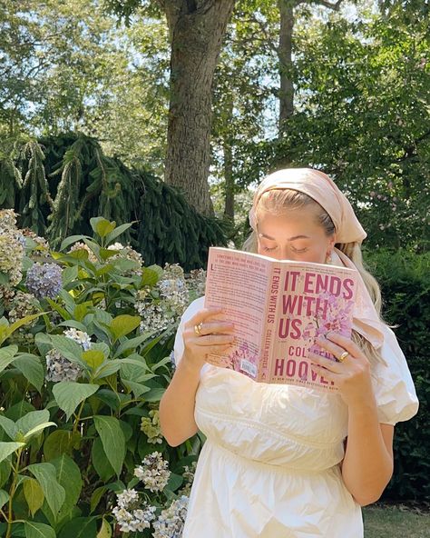 White puffy sleeve dress in a field with a floral scarf headband and a book in her hand Rameesha Core, Teresa + Core + Aesthetic, Christabel Core, Madeeha Core, Komal Core Aesthetic, Sheetal Core, Nafiseh Core, Marziyeh Core, Alizah Core