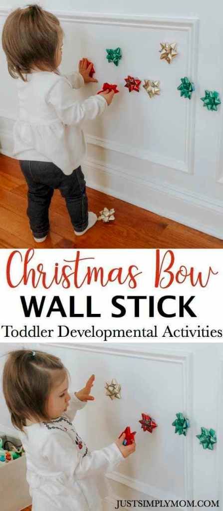 Christmas Bow Wall Stick Toddler Activity - Just Simply Mom Daycare One Year Old Room, Holiday Toddler Activities, Christmas With A Toddler, Christmas Activities For Babies, Baby Activities 1 Year, Xmas Activities, Christmas Activities For Toddlers, Bow Wall, Holidays With Toddlers