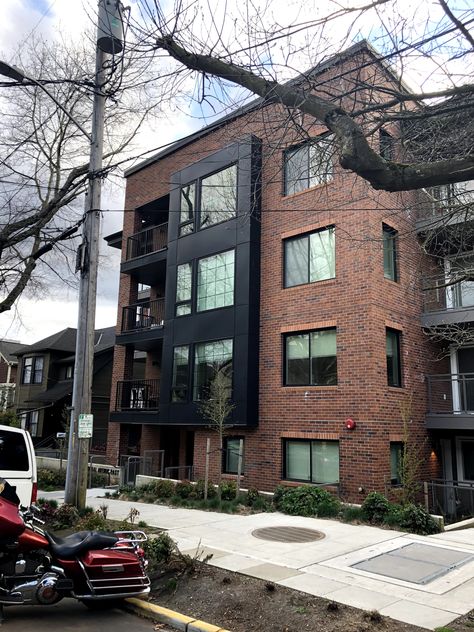 Brick Apartments Exterior, Modern Brick Building Facade, Downtown Building Exterior, Brick Facade Commercial Building, Brick Apartment Building, Apartment Exterior Design, Modern Brick Apartment Building, Apartment Complex Exterior Old, Brick Apartments