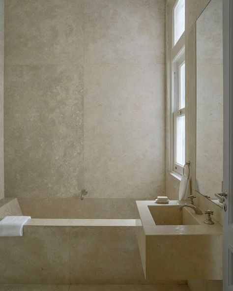 Carlos Aparicio on Instagram: "My Buenos Aires bathroom. One idea, one material. Precise, always takes my breath away. To find this ‘block of stone ‘ within the inner sanctum of this grand neoclassical apartment Is extraordinary .#architecture #interiordesign #interiorarchitecture #bathroomdesign #buenosairesrecoleta #limestone @gallery_bac" Neoclassical Apartment, Limestone Bathroom, Inner Sanctum, Country House Design, Stone Blocks, Take My Breath, Beautiful Bathrooms, Neoclassical, Bathroom Inspiration