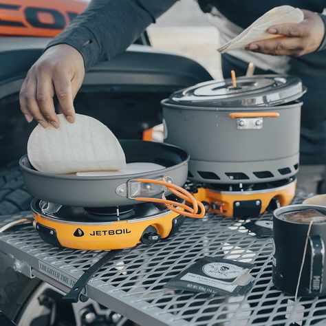 Jetboil Genesis Basecamp Backpacking and Camping Stove Cooking System with Camping Cookware Jetboil's Genesis Basecamp portable propane stove features a dual-burner design that functions as a standalone camping stove or couples with other Jetlink-compatible stoves or a Luna satellite burner to create an outdoor cooking range. Camp Stove Cooking, Best Camping Stove, Camping Cooker, Cooking For A Group, Propane Stove, Outdoor Range, Cooking Range, Camping List, Camping Cookware