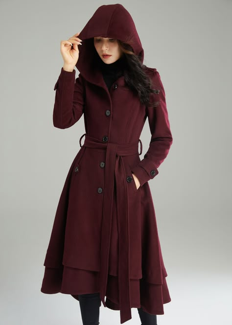 "This Wool Coat Women is made of high quality wool, durable and warm. It features the asymmetrical design to highlight your fashion sense. You will definitely be the center of attention in this elegant coat. ★★ FEATURES 50% wool, 50% fiber, nylon Polyester lining Two side pockets Button closure Long sleeve wool coat Fit and flare wool coat Hooded wool coat Belted wool coat Asymmetrical wool coat Perfect for winter, autumn Dry clean ★★Mode size Height 170cm (5′ 7″) Bust 84 cm (33\") Waist 66 cm ( Belted Wool Coat, Winter Coat Women, Mode Mantel, Hooded Wool Coat, Wool Winter Coat, Elegant Coats, Wool Coat Women, Long Coat Women, Long Wool Coat