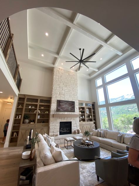 Tall Ceiling Living Room Fan, Living Room Half Vaulted Ceiling, Two Story Family Room Lighting, Two Story Living Room Ceiling Fan, Open To Above Living Room Fireplaces, Warm Modern Farmhouse Living Room, Ceiling Fan In Vaulted Living Room, Living Room 2 Story Ceiling, High Ceiling Living Room Fan