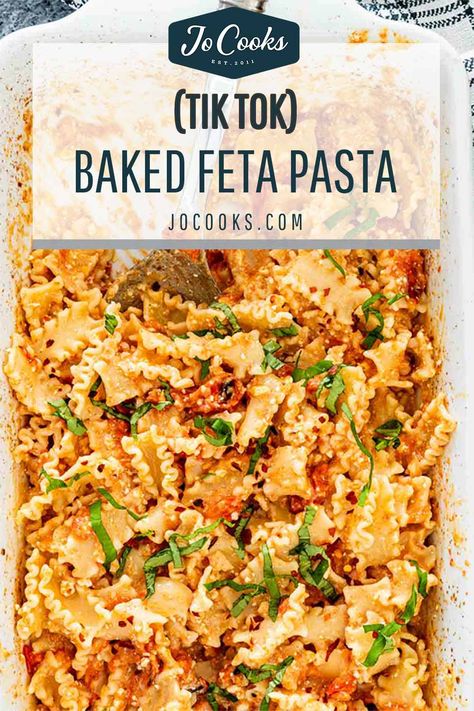 This simple Baked Feta Pasta recipe features a block of feta cheese with cherry tomatoes, roasted to perfection and tossed with pasta. #tiktokpasta #bakedfetapasta #recipe Tiktokpasta Feta, Tik Tok Pasta Feta, Tik Tok Pasta, Wheat Pasta Recipes, Baby Pasta, Tomato Pasta Bake, Tomatoes Roasted, Roasted Tomato Pasta, Baked Feta Pasta