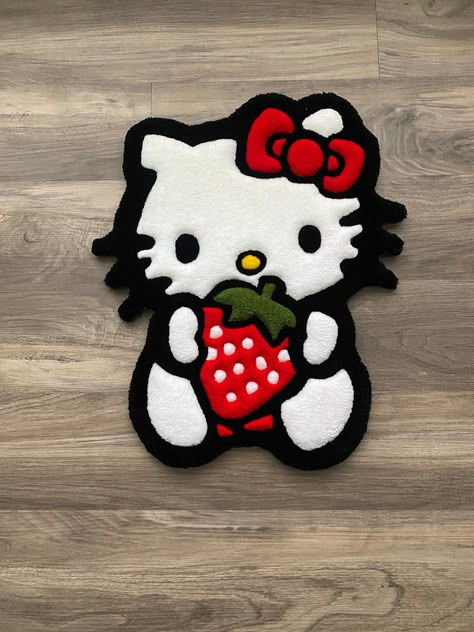 Custom Strawberry Kitty Rug All Rugs I make are carved to perfection to give your interior a refreshing and clean look to add on to your beautiful floor space I mainly make custom rugs for different businesses as well as animated designs, logos, and photos sent to me. With the help of my graphic designer I can make any idea you want to create into a rug! All my rugs are made with 100% acrylic yarn with a felt back and are very durable and long lasting. To insure the longest duration of cleanline Hello Kitty Tufted Rug, Tufted Rug Design Ideas, Hello Kitty Rug, Aesthetic Rugs, Hello Kitty Room Decor, Hello Kitty Bedroom, Graphic Rug, Funky Rugs, Hello Kitty Rooms