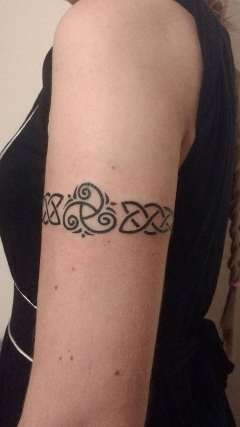 Celtic Knot Tattoo Ideas with Meaning Celtic Sleeve Tattoos For Women, Celtic Collar Bone Tattoo, Celtic Band Design, Celtic Arm Tattoos For Women, Celtic Knot Band Tattoo, Women’s Viking Tattoos, Scottish Celtic Tattoo, Irish Knot Tattoo, Scandinavian Tattoo For Women