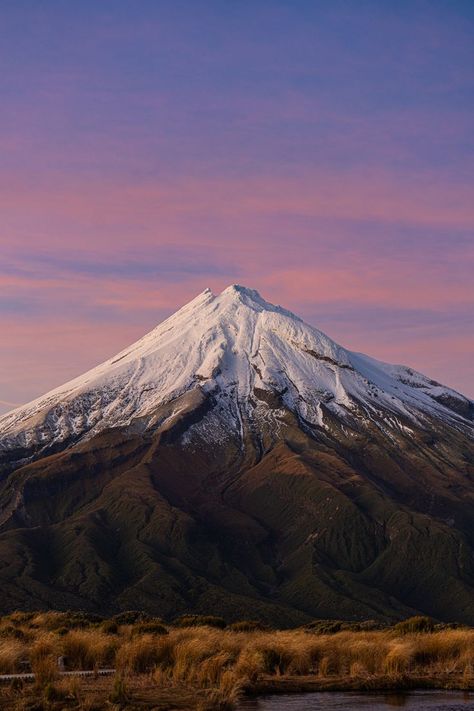 Taranaki Volcano in Taranaki New Zealand. A Nature lover's gift idea for who loves mountain and Volcano. Whether for a birthday, Christmas, or as a gift in general, it makes a great gifting item on a t-shirt, mug, hoodie and so much more. Taranaki New Zealand, Mt Taranaki, Travel Benefits, Best Travel Credit Cards, Travel Credit Cards, Best Flights, Purple Sky, Rocky Mountain National, Cool Countries