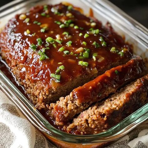 Meatloaf is one of those classic comfort foods that brings warmth and nostalgia to the dinner table. This Sweet and Savory Brown Sugar Meatloaf elevates Beef And Pork Meatloaf Recipes, Meatloaf Recipes Brown Sugar, Meatloaf And Gravy Recipes, Brown Sugar Meatloaf Recipes, Meatloaf Glaze Recipes, Meatloaf With Brown Sugar, Meatloaf Gravy Recipe, Meatloaf Glaze Recipe, Brown Gravy Meatloaf