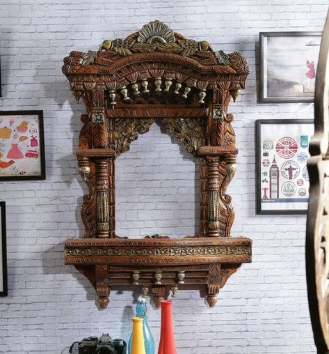 Product Size: 24 L X 4 W X 39 H (inches) Wooden Beautiful Traditional Jharokha is mainly used in old times by the Kings and Queens to greet the general public. Jharokha is a resemblance to the Royal time depicting the Balcony in Royal Palaces for Kings and Queens. The wooden Jharokha are used from that time. Now, these days people are again started using the wooden Jharokha to give that traditional and lavish look to there home. So we are introducing the wooden Jharokha in traditional design and