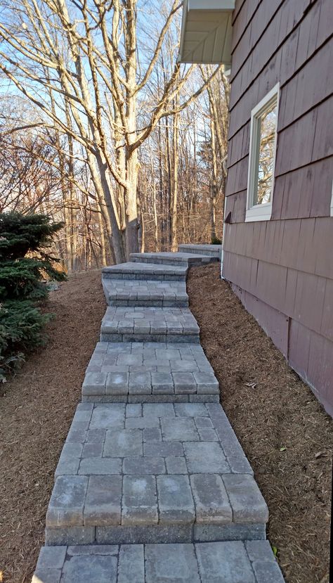 steps using "Brussels" pavers by Unilock Pavers On Sloped Yard, Diy Outdoor Stairs On Hill, Paver Stairs On Hill, Paver Patio On Sloped Yard, Sloped Pathway Ideas, Paver Steps Stairs, Paver Steps On Slope, Steps With Pavers, Pavers Steps