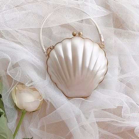 @lulu_guinness LikeShop Shell Clutch Bag, Lulu Collection, Little Mermaid Wedding, Shell Clutch, Bridal Aesthetic, Luxury Closets, The World Is Your Oyster, World Is Your Oyster, Modern Bag