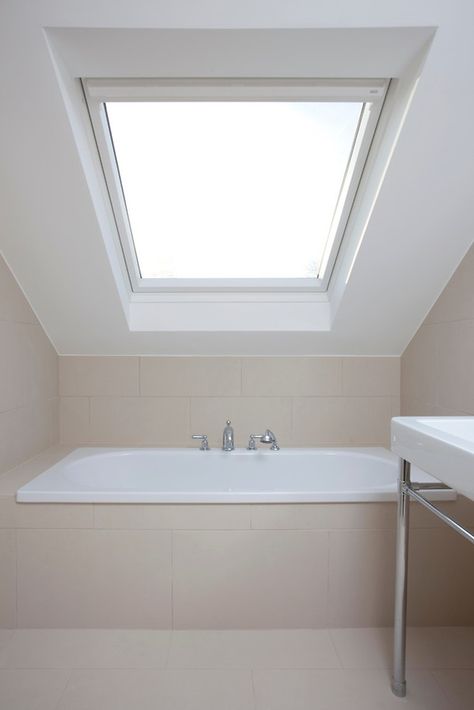 bathtub under the eave - think I'd prefer the window going horizontally Small Attic Bathroom Sloped Ceiling, Sloped Ceiling Bathroom, Attic Shower, Sloping Ceiling, Small Attic Bathroom, Full Bathroom Remodel, Loft Bathroom, Budget Bathroom Remodel, New Bathroom Ideas