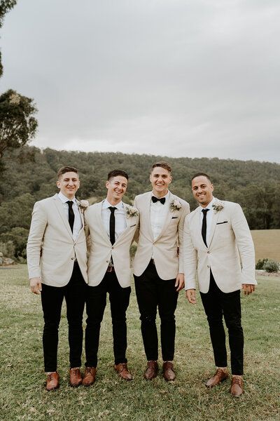 Groomsmen Attire Black Suit Champagne Tie, Groomsmen Attire Tan Champagne, Tan And Brown Groomsmen Suits, Black Bridesmaid Dresses Tan Groomsmen, Groomsmen Attire Tan, Bridesmaid Dresses Tan, Summer Groomsmen Attire, Brown Groomsmen Suits, Tan Groomsmen Suits