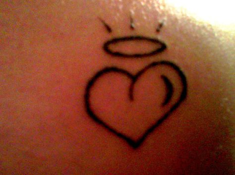 heart and halo tattoo Halo Heart Tattoo, Heart With Halo Tattoo, Halo Tattoo Ideas, Halo Tattoo, Serenity Art, Cool Wrist Tattoos, Heart Tattoos, Lip Tattoos, Tat Ideas