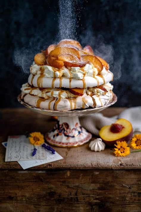 This brown sugar layered pavlova with caramelised peaches looks stunning and tastes sensational. The perfect easy summer dessert that’s sure to WOW everyone. #pavlova #peaches #dessert #meringue #foodphotography Layered Pavlova, Caramelized Peaches, Summer Desserts Easy Healthy, Pavlova Dessert, Pavlova Recipe, Easy Summer Desserts, Desserts For A Crowd, Fancy Desserts, Desserts To Make