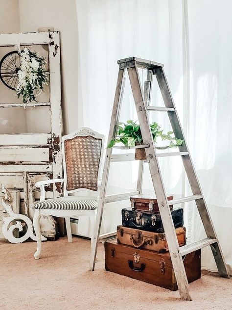 This is an off the wall type project; but it's fun and unique! I have had this wood ladder for a while now. Originally, I painted it and added wood planks as shelves, to create a ladder shelf of sorts. Over the years, the ladder has just been sitting in a corner; but an idea came to me! Why not create a fun piece of decor that's different and not your typical "shelf."That's when I decided a hanging basket plant and some old suitcases could really help turn this old ladder into somethin… Plant Hanger Decor, Galvanized Wall Planter, Diy Tufted Headboard, Patio Installation, Basket Plant, Shelf Cover, Old Ladder, Diy Blanket Ladder, Bubble Painting