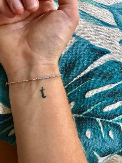 my small t tattoo for my little sister ~ Small Initial Tattoo, T Tattoo, Initial Tattoo, Sister Tattoos, Little Sisters, Fish Tattoos, Jesus Fish Tattoo, Triangle Tattoo, Initials