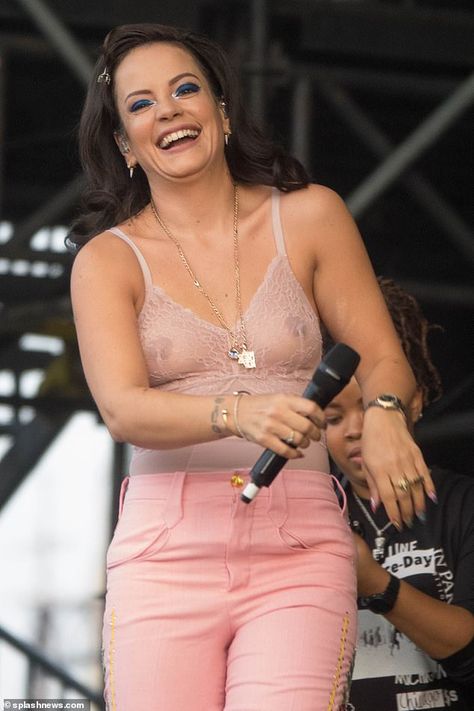 Dare to be bold: Lily Allen left very little to the imagination as she performed onstage a... Attractive Celebrities, Big Lips Natural, Allen Collins, Transparent Clothing, Female Body Paintings, Black Lace Gown, Body Paintings, Gov Ball, Lily Allen